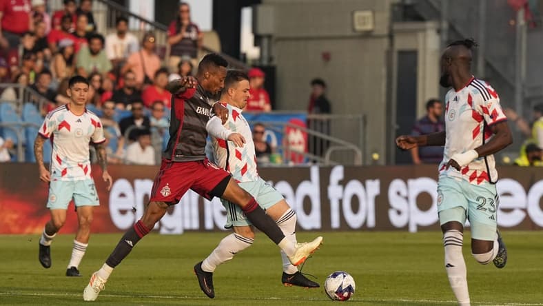 May 31, 2023; Toronto, Ontario, CAN; Toronto FC midfielder Mark-Anthony Kaye (14) chases the ball with Chicago Fire midfielder Xherdan Shaqiri (10) at BMO Field. Mandatory Credit: John E. Sokolowski-USA TODAY Sports