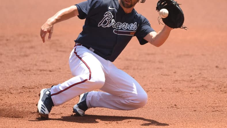 Jul 16, 2020; Atlanta, Georgia, United States; Atlanta Braves second baseman Charlie Culberson (8) fields a ground ball during an intrasquad game in their summer workout session at Truist Park. Mandatory Credit: John David Mercer-USA TODAY Sports
