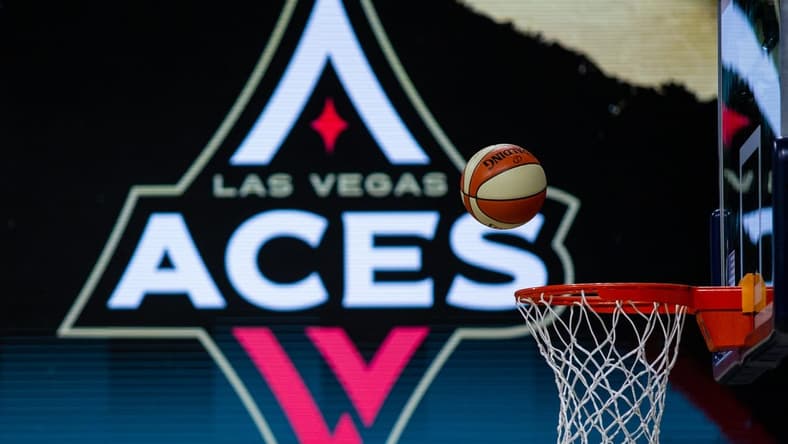 Oct 2, 2020; Bradenton, Florida, USA; A game ball falls through the net as the Las Vegas Aces warm up before game 1 of the WNBA finals against the Seattle Storm at IMG Academy. Mandatory Credit: Mary Holt-USA TODAY Sports