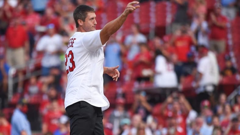 Aug 17, 2021; St. Louis, Missouri, USA; Former St. Louis Cardinals third baseman David Freese and 2011 NLCS and World Series MVP throws out a first pitch prior to a game against the Milwaukee Brewers at Busch Stadium. Mandatory Credit: Joe Puetz-USA TODAY Sports