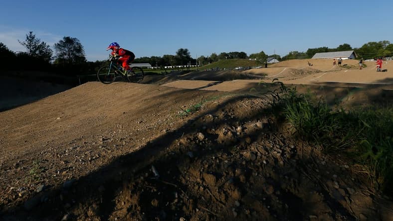 Ryder Osowski of Westerville takes a warm-up lap around the course during the weekly organized racing at the new Westerville BMX course at Alum Creek South Park on Tuesday, Sept. 7, 2021. The 1,000-foot track just opened for racing at the beginning of August.

Westerville Bmx