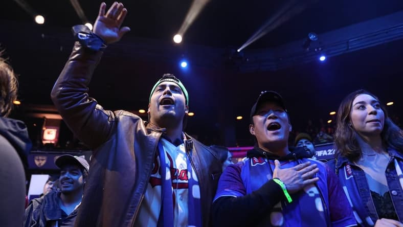 Fans Mark Escamilla, left, and John Chun, right, cheer for Austin FC eMLS player John Garcia during the eMLS Cup tournament at the Moody Theater on March 13, 2022. The eMLS Cup is the championship tournament that determines which player is the best FIFA esports player in North America.
Aem Sxsw Emls Cup 17