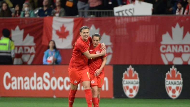 Apr 8, 2022; Vancouver, BC, Canada;  Women's Canadian National midfielder Jessie Fleming (17) celebrates her goal with forward Christine Sinclair (12) during the second half against Women's Nigeria National team at BC Place. Mandatory Credit: Anne-Marie Sorvin-USA TODAY Sports