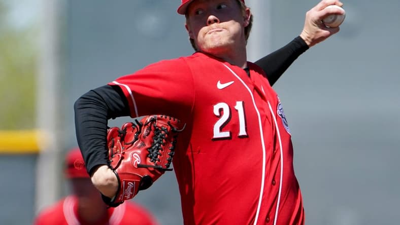 Cincinnati Reds minor league pitcher Andrew Abbott (21) delivers during a spring training game against the Cleveland Guardians, Wednesday, March 23, 2022, at the team's spring training facility in Goodyear, Ariz.
Cincinnati Reds Spring Training March 23 0434