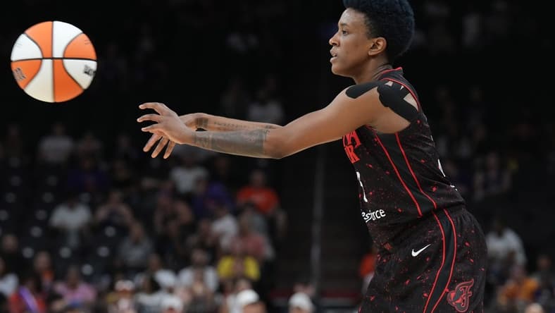 Jun 29, 2022; Phoenix, Arizona, USA; Indiana Fever guard Danielle Robinson (3) passes the ball against the Phoenix Mercury during the second half at Footprint Center. Mandatory Credit: Joe Camporeale-USA TODAY Sports