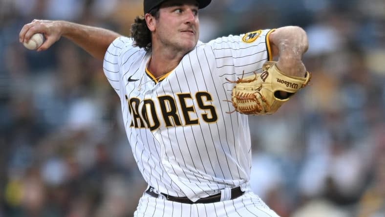 Aug 2, 2022; San Diego, California, USA; San Diego Padres starting pitcher Reiss Knehr (33) throws a pitch against the Colorado Rockies during the first inning at Petco Park. Mandatory Credit: Orlando Ramirez-USA TODAY Sports