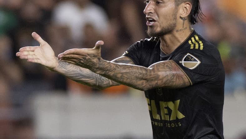 Aug 31, 2022; Houston, Texas, USA; Los Angeles FC forward Cristian Arango (9) reacts toward referee Mathew Conger (not pictured) in the first half against Houston Dynamo FC at PNC Stadium. Mandatory Credit: Thomas Shea-USA TODAY Sports
