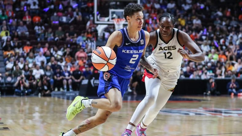 Sep 18, 2022; Uncasville, Connecticut, USA; Connecticut Sun guard Natisha Hiedeman (2) and Las Vegas Aces guard Chelsea Gray (12) during game four of the 2022 WNBA Finals at Mohegan Sun Arena. Mandatory Credit: Wendell Cruz-USA TODAY Sports