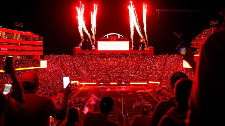 Oct 1, 2022; Lincoln, Nebraska, USA; Fans participate in a light show at the end of the third quarter between the Nebraska Cornhuskers and the Indiana Hoosiers at Memorial Stadium. Mandatory Credit: Dylan Widger-USA TODAY Sports