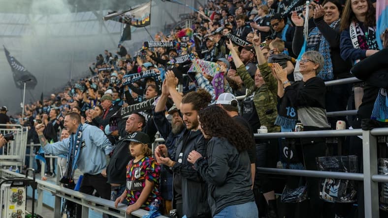 Oct 9, 2022; Saint Paul, Minnesota, USA; Fans celebrate a win and a trip to the playoffs as the Minnesota United defeat the Vancouver Whitecaps 2-0 at Allianz Field. Mandatory Credit: Matt Blewett-USA TODAY Sports