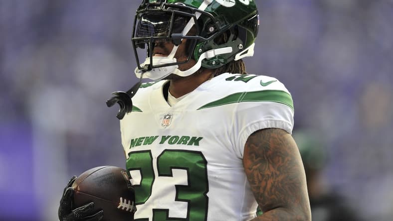 Dec 4, 2022; Minneapolis, Minnesota, USA; New York Jets running back James Robinson (23) warms up before the game against the Minnesota Vikings at U.S. Bank Stadium. Mandatory Credit: Jeffrey Becker-USA TODAY Sports