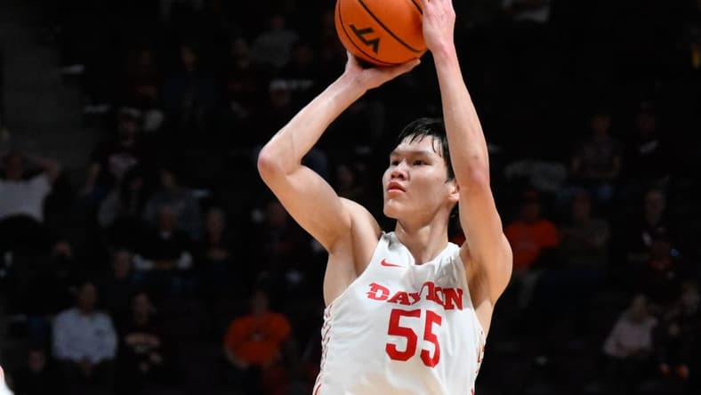 Dec 7, 2022; Blacksburg, Virginia, USA; Dayton Flyers forward Mike Sharavjamts (55) shoots during game against the Virginia Tech Hokies at Cassell Coliseum. Mandatory Credit: Lee Luther Jr.-USA TODAY Sports