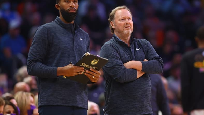 Feb 10, 2022; Phoenix, Arizona, USA; Milwaukee Bucks head coach Mike Budenholzer (right) and assistant coach Charles Lee against the Phoenix Suns in the second half at Footprint Center. Mandatory Credit: Mark J. Rebilas-USA TODAY Sports