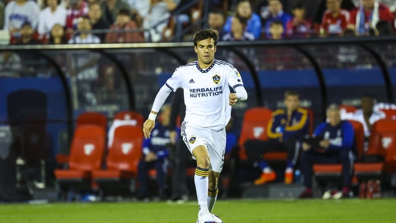 Mar 4, 2023; Frisco, Texas, USA;  Los Angeles Galaxy midfielder Riqui Puig (6) dribbles the ball during the second half against FC Dallas at Toyota Stadium. Mandatory Credit: Kevin Jairaj-USA TODAY Sports