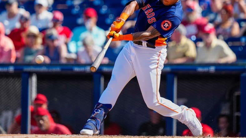 Mar 5, 2023; West Palm Beach, Florida, USA; Houston Astros right fielder Bligh Madris (66) hits a single against the Washington Nationals during the fifth inning at The Ballpark of the Palm Beaches. Mandatory Credit: Rich Storry-USA TODAY Sports