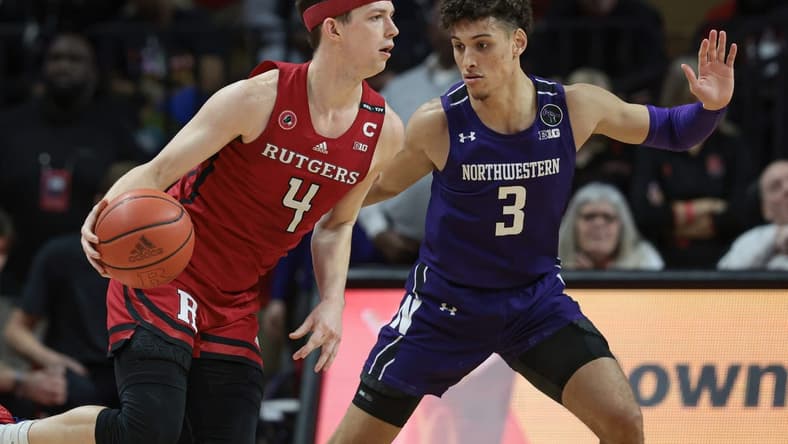 Mar 5, 2023; Piscataway, New Jersey, USA; Rutgers Scarlet Knights guard Paul Mulcahy (4) dribbles as Northwestern Wildcats guard Ty Berry (3) defends during the first half at Jersey Mike's Arena. Mandatory Credit: Vincent Carchietta-USA TODAY Sports