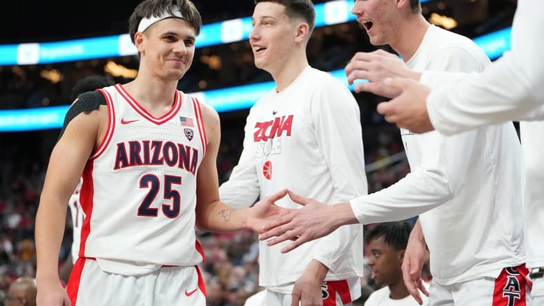 Mar 9, 2023; Las Vegas, NV, USA; Arizona Wildcats guard Kerr Kriisa (25) returns to the bench after a shift against the Stanford Cardinal during the second half at T-Mobile Arena. Mandatory Credit: Stephen R. Sylvanie-USA TODAY Sports