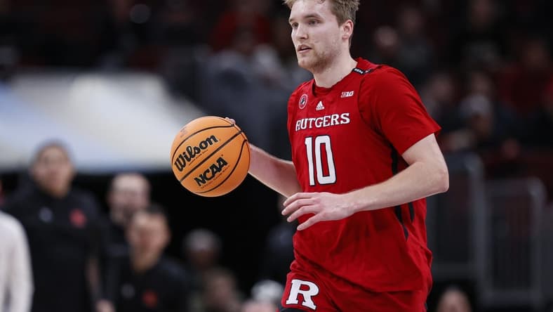 Mar 10, 2023; Chicago, IL, USA; Rutgers Scarlet Knights guard Cam Spencer (10) brings the ball up court against the Purdue Boilermakers during the first half at United Center. Mandatory Credit: Kamil Krzaczynski-USA TODAY Sports