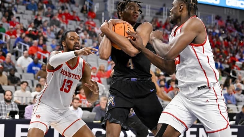 Mar 12, 2023; Fort Worth, TX, USA; Memphis Tigers forward Chandler Lawson (4) grabs a rebound in front of Houston Cougars forward J'Wan Roberts (13) and forward Jarace Walker (25) during the first half at Dickies Arena. Mandatory Credit: Jerome Miron-USA TODAY Sports