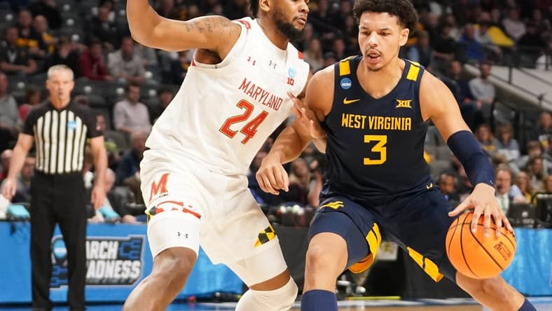 Mar 16, 2023; Birmingham, AL, USA; West Virginia Mountaineers forward Tre Mitchell (3) dribbles against Maryland Terrapins forward Donta Scott (24) during the first half in the first round of the 2023 NCAA Tournament at Legacy Arena. Mandatory Credit: Marvin Gentry-USA TODAY Sports