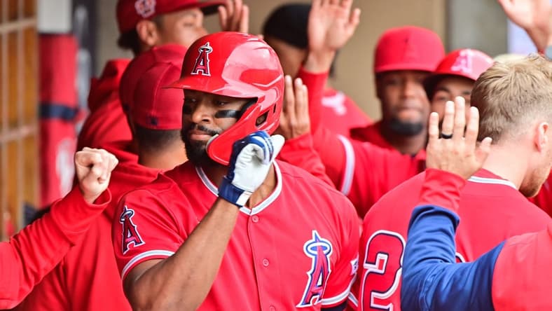 Mar 21, 2023; Salt River Pima-Maricopa, Arizona, USA; Los Angeles Angels left fielder Jo Adell (7) celebrates with teammates after hitting a two run home run in the first inning against the Arizona Diamondbacks during a Spring Training game at Salt River Fields at Talking Stick. Mandatory Credit: Matt Kartozian-USA TODAY Sports