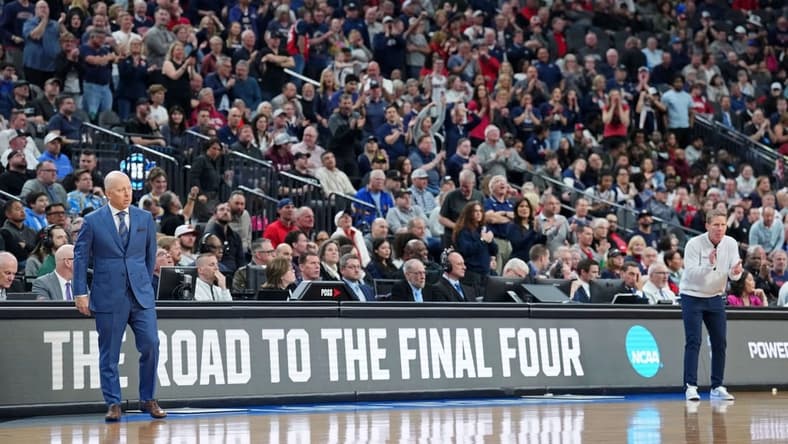 Mar 23, 2023; Las Vegas, NV, USA; UCLA Bruins head coach Mick Cronin (left) and Gonzaga Bulldogs head coach Mark Few watch their teams play during the second half at T-Mobile Arena. Mandatory Credit: Joe Camporeale-USA TODAY Sports
