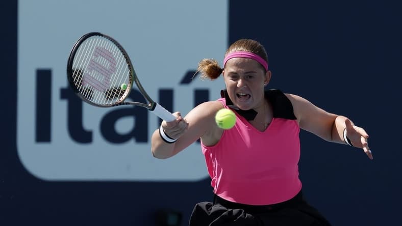 Mar 27, 2023; Miami, Florida, US; Jelena Ostapenko (LAT) hits a forehand against Martina Trevisan (ITA) (not pictured) on day eight of the Miami Open at Hard Rock Stadium. Mandatory Credit: Geoff Burke-USA TODAY Sports