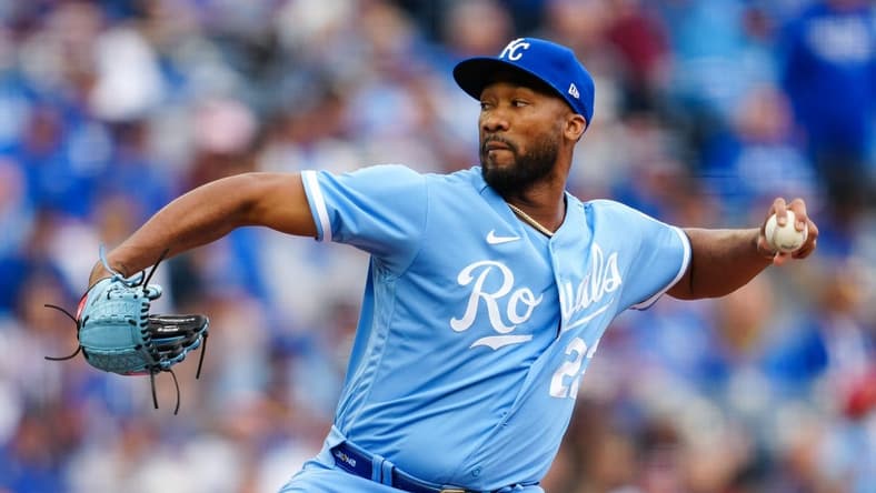Mar 30, 2023; Kansas City, Missouri, USA; Kansas City Royals relief pitcher Amir Garrett (22) pitches during the sixth inning against the Minnesota Twins at Kauffman Stadium. Mandatory Credit: Jay Biggerstaff-USA TODAY Sports
