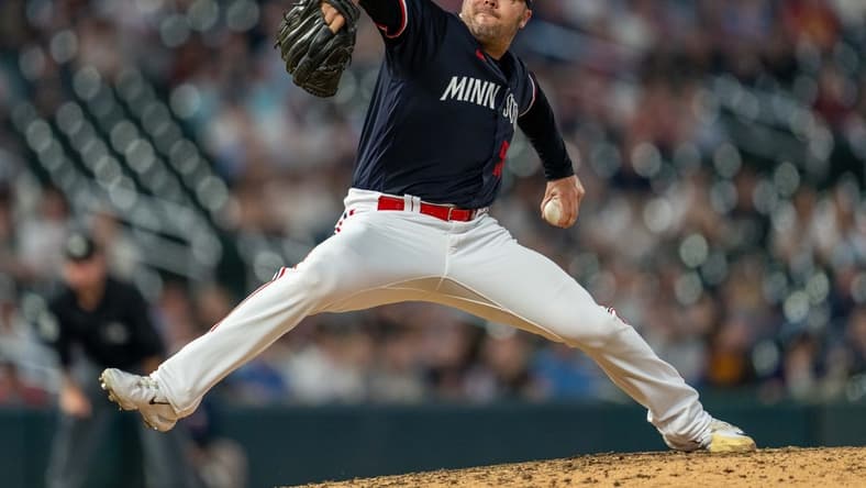 Apr 11, 2023; Minneapolis, Minnesota, USA; Minnesota Twins relief pitcher Caleb Thielbar (56) pitches to the Chicago White Sox in the eighth inning at Target Field. Mandatory Credit: Matt Blewett-USA TODAY Sports