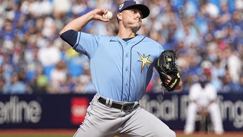 Apr 15, 2023; Toronto, Ontario, CAN; Tampa Bay Rays pitcher Calvin Faucher pitches to  to the Toronto Blue Jays during the first inning on Jackie Robinson day at Rogers Centre. Mandatory Credit: John E. Sokolowski-USA TODAY Sports