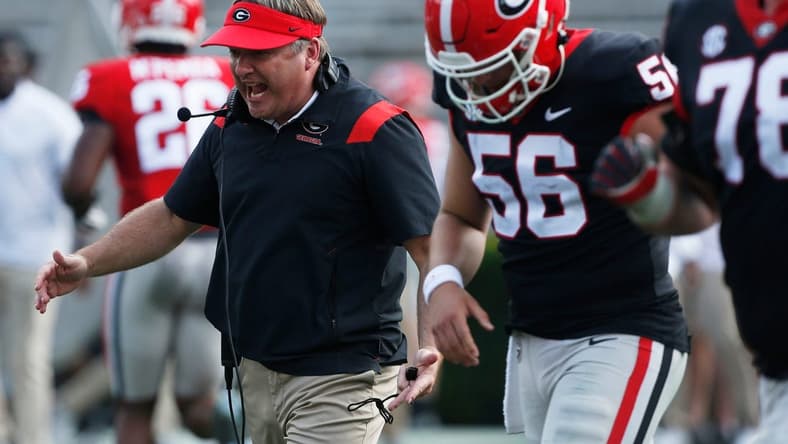Georgia head coach Kirby Smart speaks with the black team during the UGA G-Day spring football game at Sanford Stadium in Athens on Saturday.
News Joshua L Jones