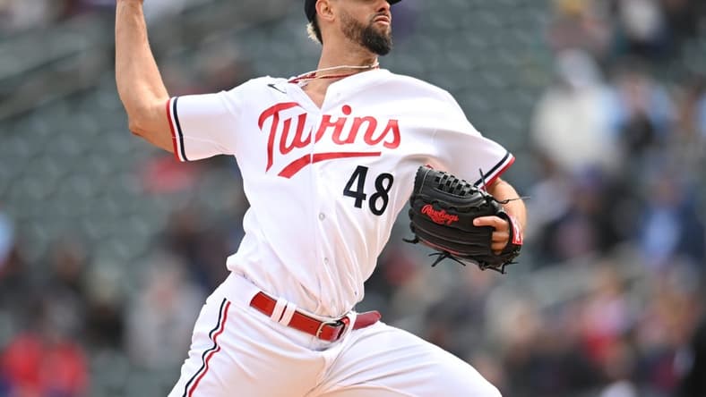 Apr 29, 2023; Minneapolis, Minnesota, USA; Minnesota Twins relief pitcher Jorge Lopez (48) throws a pitch against the Kansas City Royals during the eighth inning at Target Field. Mandatory Credit: Jeffrey Becker-USA TODAY Sports