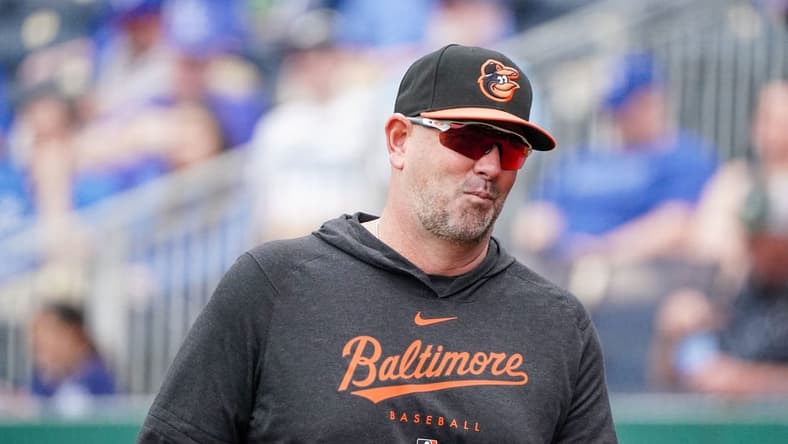 May 4, 2023; Kansas City, Missouri, USA; Baltimore Orioles manager Brandon Hyde (18) returns to the dugout against the Kansas City Royals during the game at Kauffman Stadium. Mandatory Credit: Denny Medley-USA TODAY Sports