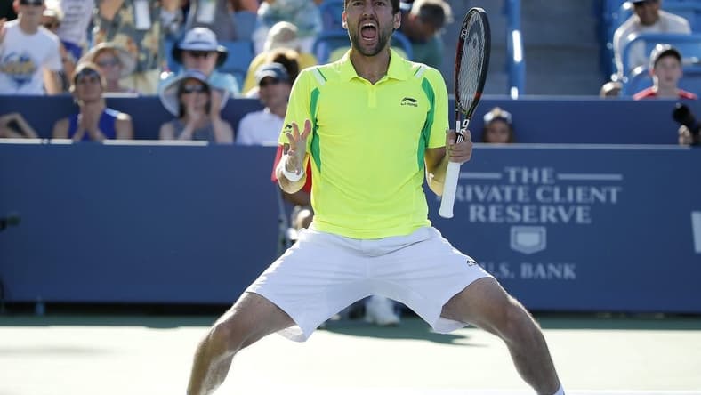 Marin Cilic celebrates after beating Andy Murray, 6-4, 7-5, to win the Western and Southern Open at The Lindner Family Tennis Center in Mason Sunday August 21, 2016.