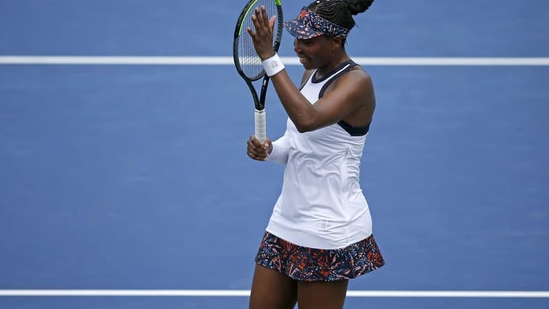 Venus Williams celebrates after her win against Kiki Bertens at the Lindner Family Tennis Center in Mason, Ohio, on Tuesday, Aug. 13, 2019. Williams won in three sets, 6-3, 3-6, 7-4.
