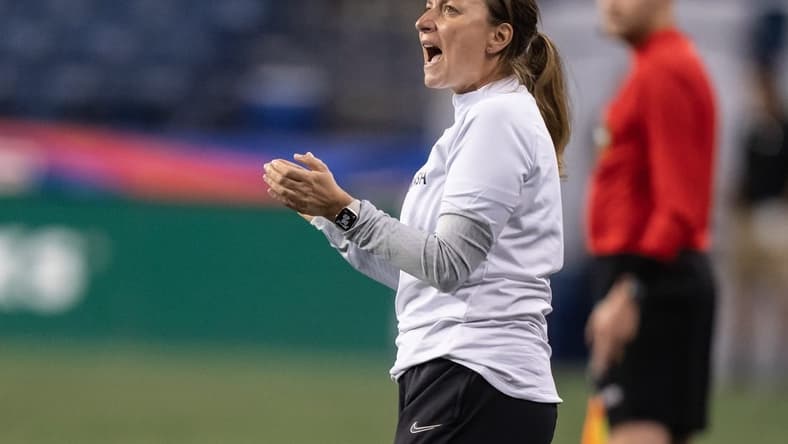 May 3, 2023; Seattle, Washington, USA; Angel City FC head coach Freya Coombe yells to her team during a match against OL Reign at Lumen Field. Mandatory Credit: Stephen Brashear-USA TODAY Sports