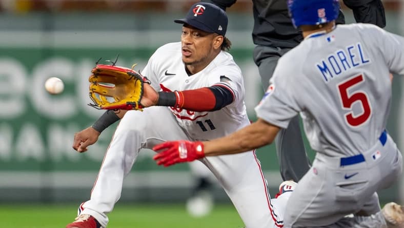 May 12, 2023; Minneapolis, Minnesota, USA; Minnesota Twins second baseman Jorge Polanco (11) gets Chicago Cubs center fielder Christopher Morel (5) out while trying to steal second base in the fifth inning at Target Field. Mandatory Credit: Matt Blewett-USA TODAY Sports
