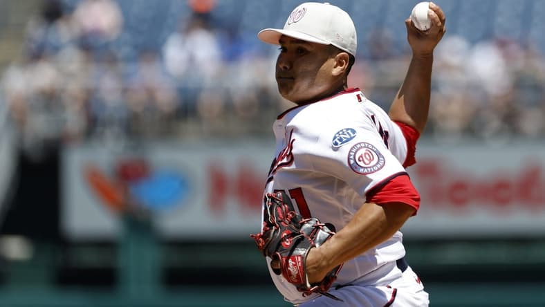 May 14, 2023; Washington, District of Columbia, USA; Washington Nationals relief pitcher Erasmo Ramirez (61) pitches against the New York Mets during the third inning of the continuation of a suspended game at Nationals Park. Mandatory Credit: Geoff Burke-USA TODAY Sports
