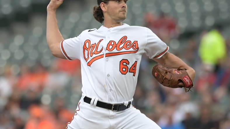 May 16, 2023; Baltimore, Maryland, USA; Baltimore Orioles starting pitcher Dean Kremer (64) throws a first inning pitch against the Los Angeles Angels at Oriole Park at Camden Yards. Mandatory Credit: Tommy Gilligan-USA TODAY Sports