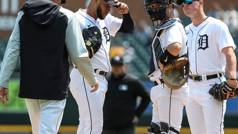 Tigers pitcher Eduardo Rodriguez meets with teammate and pitching coach Chris Fetter during the fifth inning of the Tigers' 8-0 loss on Wednesday, May 17, 2023, at Comerica Park.
