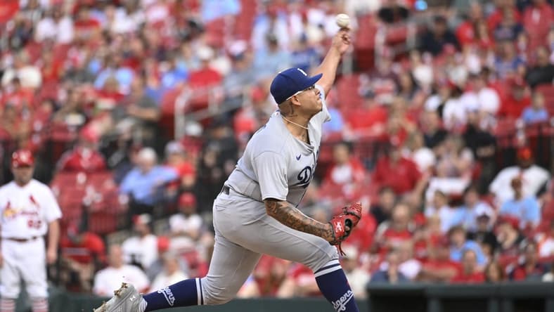 May 18, 2023; St. Louis, Missouri, USA; Los Angeles Dodgers starting pitcher Julio Urias (7) pitches against the St. Louis Cardinals in the first inning at Busch Stadium. Mandatory Credit: Joe Puetz-USA TODAY Sports