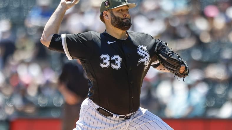 May 21, 2023; Chicago, Illinois, USA; Chicago White Sox starting pitcher Lance Lynn (33) pitches against the Kansas City Royals during the first inning at Guaranteed Rate Field. Mandatory Credit: Kamil Krzaczynski-USA TODAY Sports
