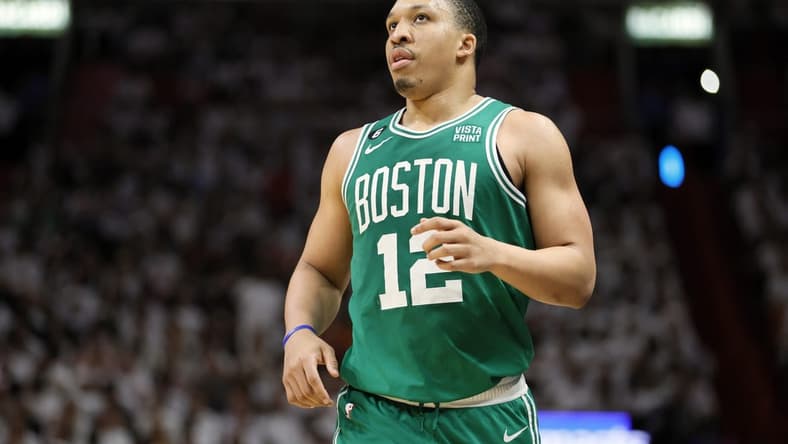 May 23, 2023; Miami, Florida, USA; Boston Celtics forward Grant Williams (12) looks on in the fourth quarter against the Miami Heat during game four of the Eastern Conference Finals for the 2023 NBA playoffs at Kaseya Center. Mandatory Credit: Sam Navarro-USA TODAY Sports
