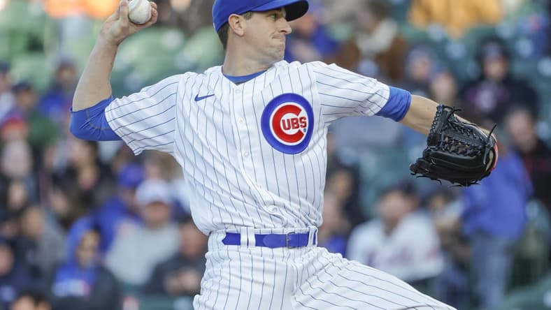 May 25, 2023; Chicago, Illinois, USA; Chicago Cubs starting pitcher Kyle Hendricks pitches against the New York Mets during the first inning at Wrigley Field. Mandatory Credit: Kamil Krzaczynski-USA TODAY Sports