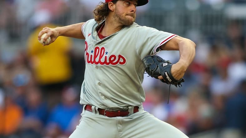 May 25, 2023; Atlanta, Georgia, USA; Philadelphia Phillies starting pitcher Aaron Nola (27) throws against the Atlanta Braves in the second inning at Truist Park. Mandatory Credit: Brett Davis-USA TODAY Sports