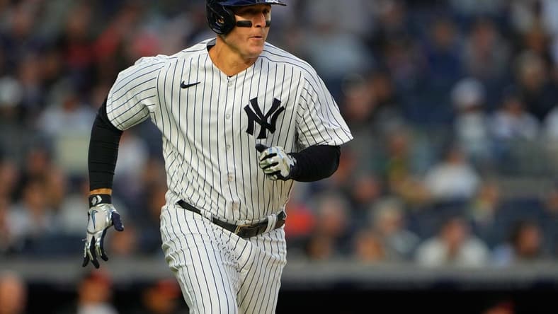 May 23, 2023; Bronx, New York, USA; New York Yankees first baseman Anthony Rizzo (48) runs out a single against the Baltimore Orioles during the third inning at Yankee Stadium. Mandatory Credit: Gregory Fisher-USA TODAY Sports