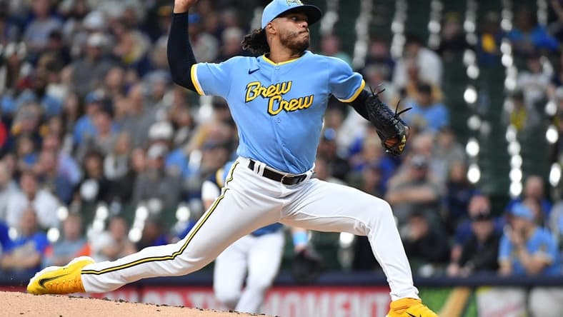 May 26, 2023; Milwaukee, Wisconsin, USA; Milwaukee Brewers starting pitcher Freddy Peralta (51) delivers a pitch against the San Francisco Giants in the second inning at American Family Field. Mandatory Credit: Michael McLoone-USA TODAY Sports