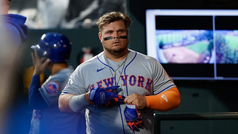 May 26, 2023; Denver, Colorado, USA; New York Mets designated hitter Daniel Vogelbach (32) in the dugout after striking out in the sixth inning against the Colorado Rockies at Coors Field. Mandatory Credit: Isaiah J. Downing-USA TODAY Sports