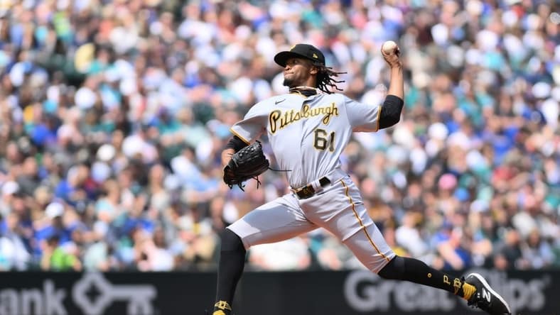 May 27, 2023; Seattle, Washington, USA; Pittsburgh Pirates relief pitcher Jose Hernandez (61) pitches to the Seattle Mariners during the third inning at T-Mobile Park. Mandatory Credit: Steven Bisig-USA TODAY Sports