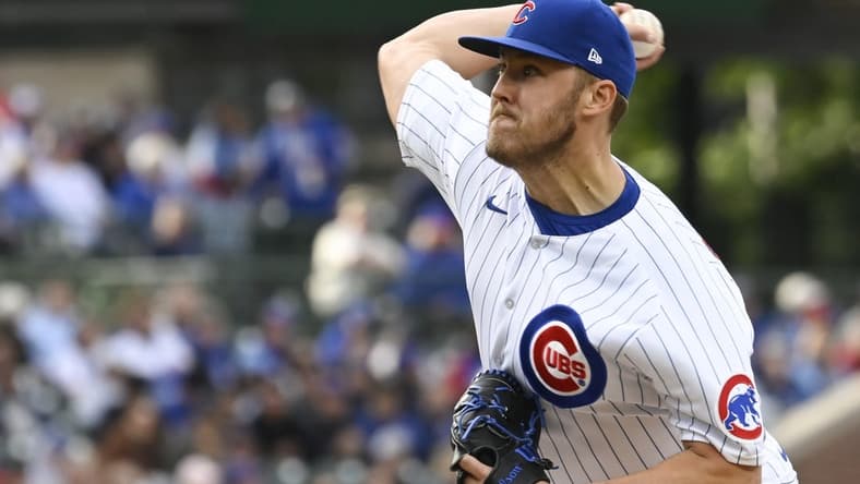 May 27, 2023; Chicago, Illinois, USA; Chicago Cubs starting pitcher Jameson Taillon (50) delivers against the Cincinnati Reds during the first inning at Wrigley Field. Mandatory Credit: Matt Marton-USA TODAY Sports